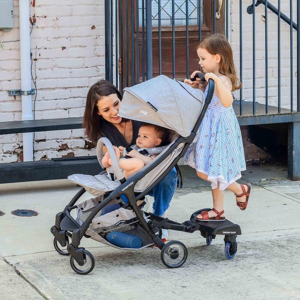 Stroller standing clearance attachment